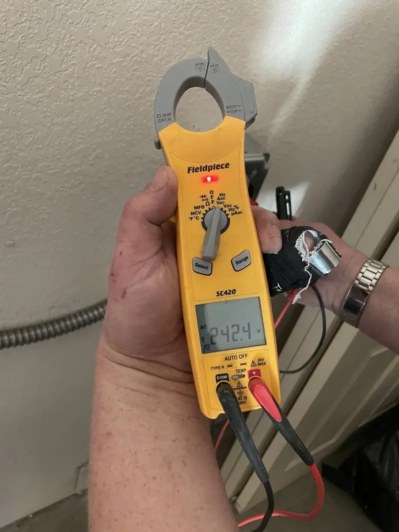 Voltage testing with clamp meter during Hot Tub / Pool Electrical Wiring in Otsego